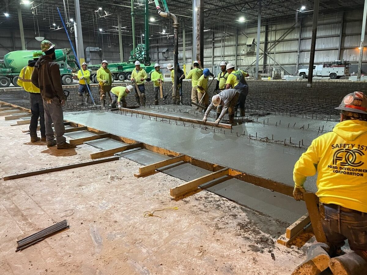 team working on concrete